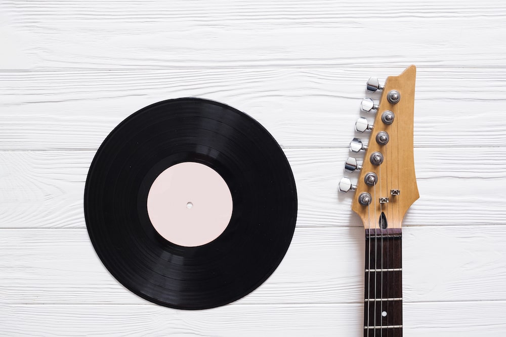 vinyl-record-with-guitar vinyl-record-with-guitar